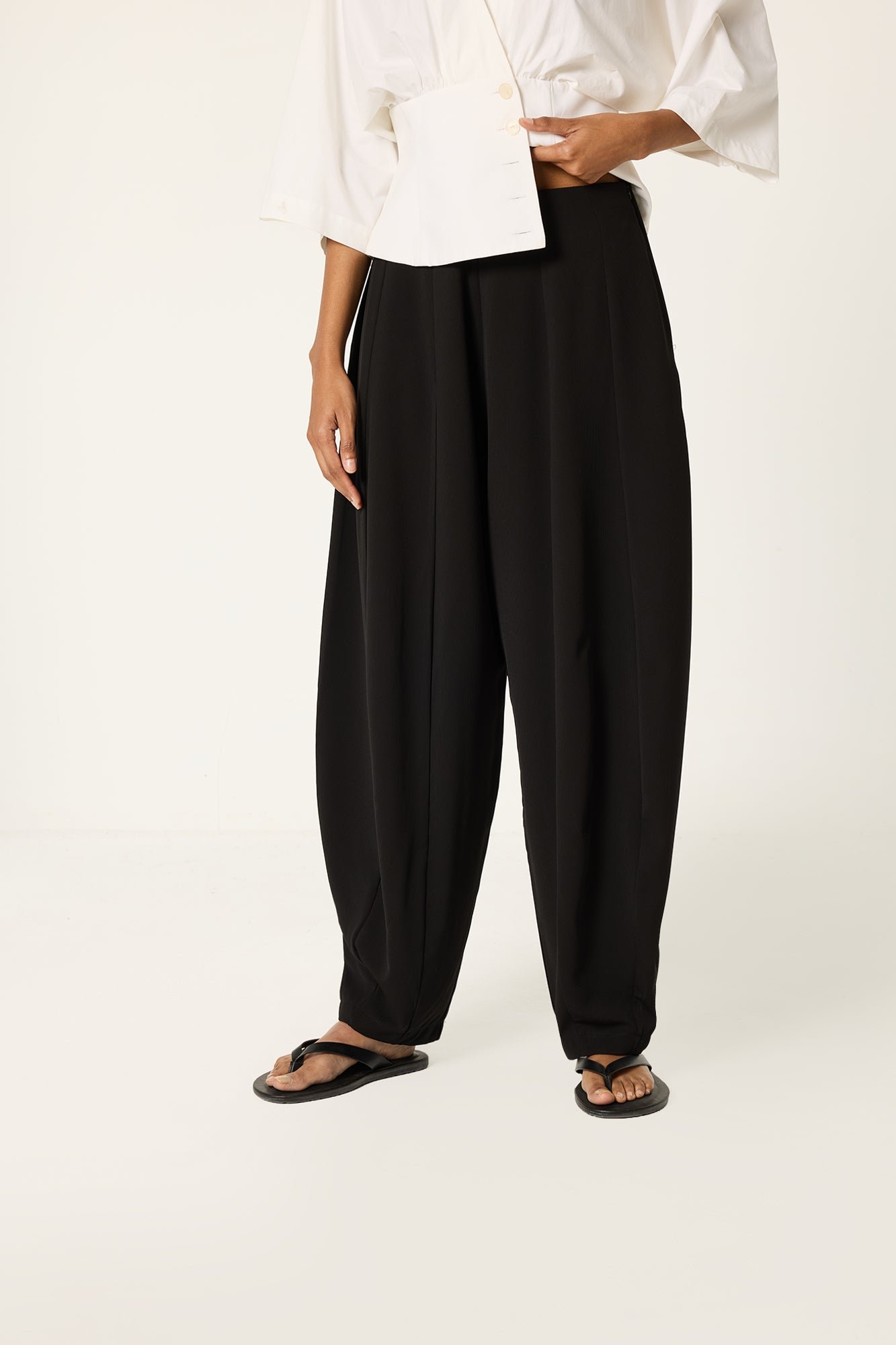 PLEATED CREPE TROUSERS