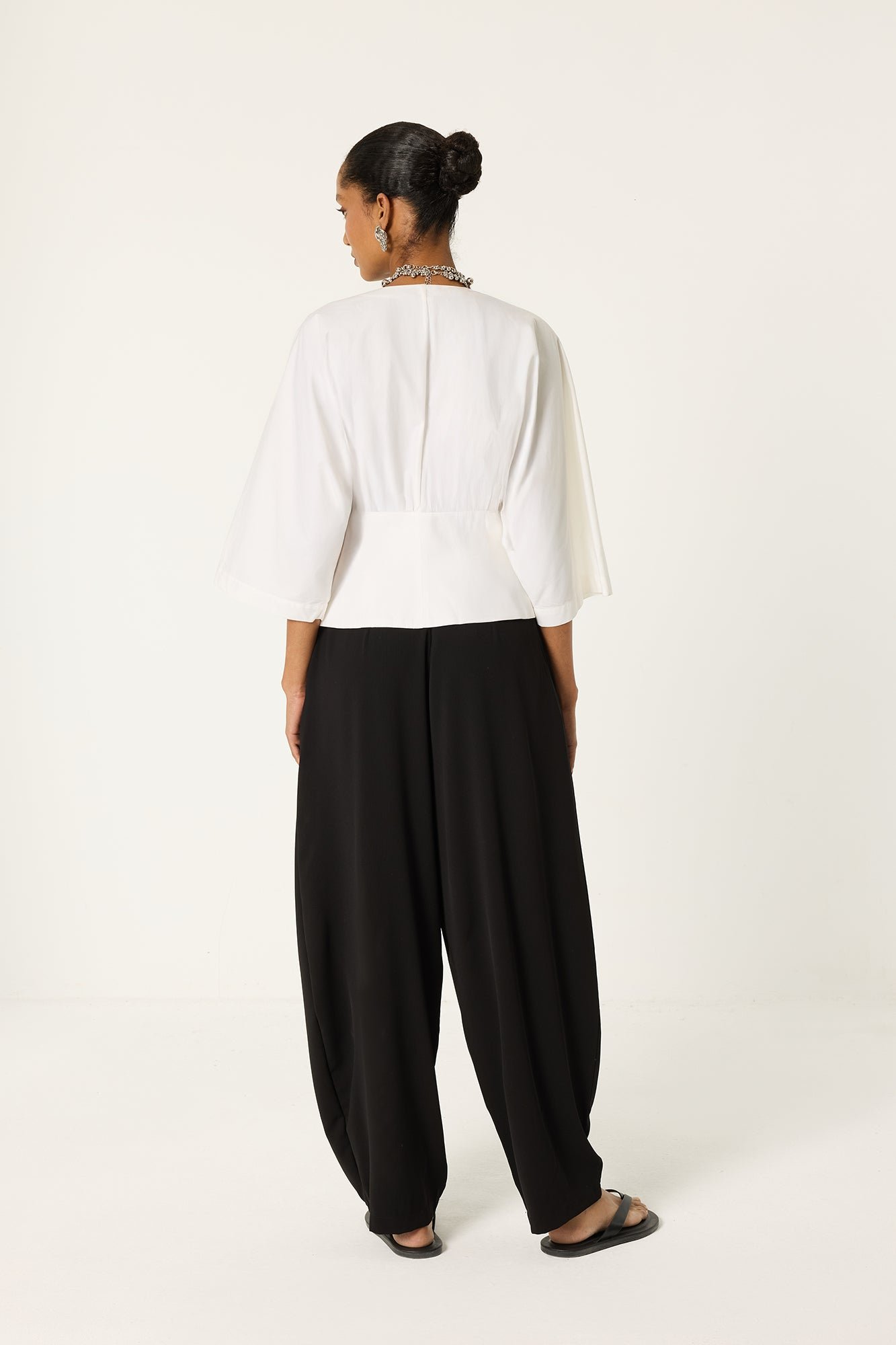 PLEATED CREPE TROUSERS